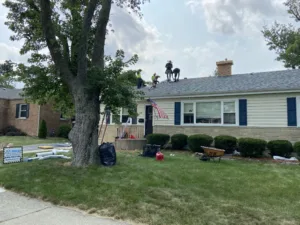 Roofing crew on roof