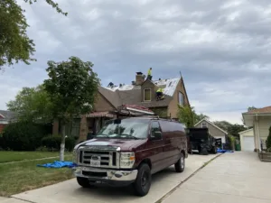 Roofing crew on roof