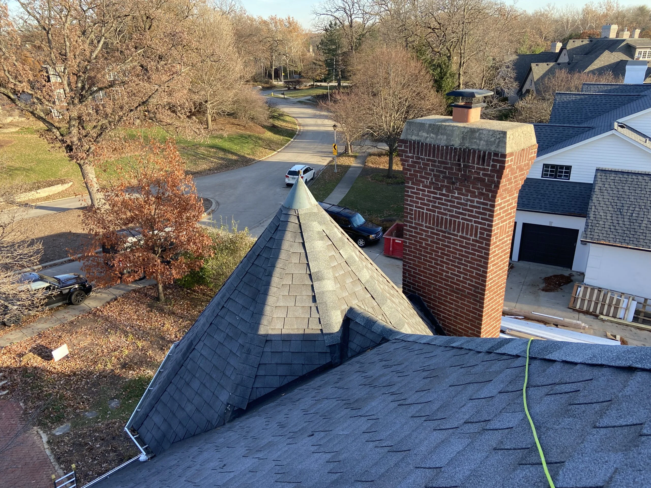 Roofing contractors at work
